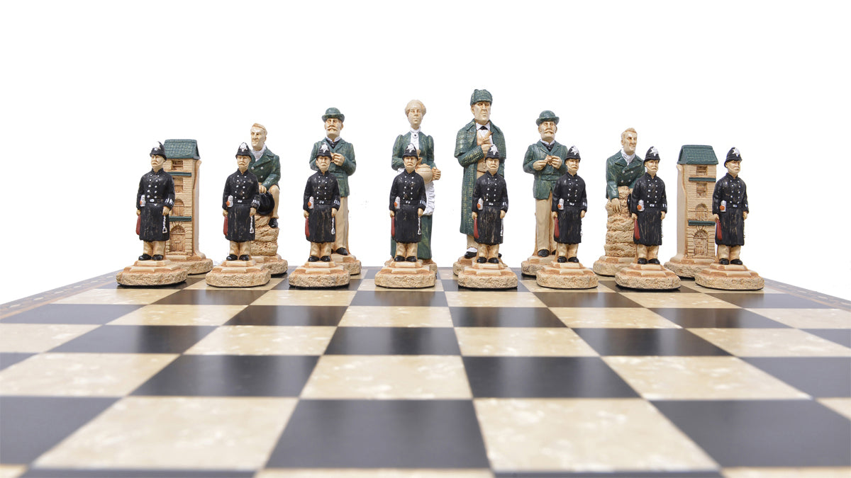A low angle shot of The Sherlock side of a hand-painted chess set featuring figurines of Sherlock Holmes, Mrs Hudson, Doctor Watson, Inspector Lestrade, 221b Baker Street & Victorian Police Constables.
Atop a black and white chess board.
