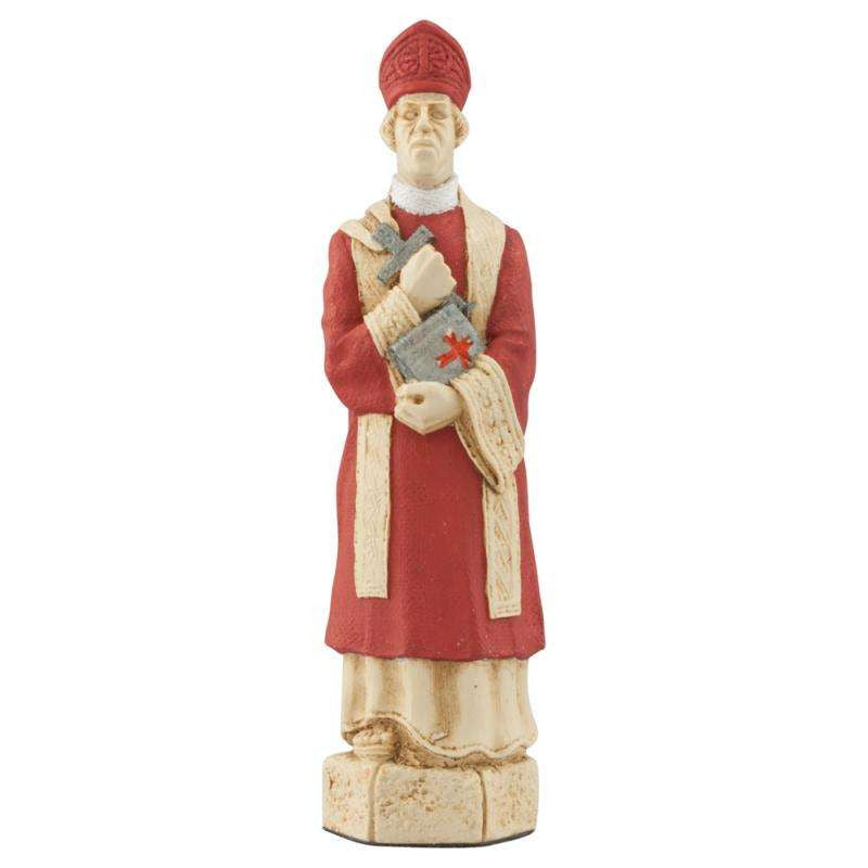 A handmade chess piece depicting a Christian Bishop in typical garments suitable for the period.