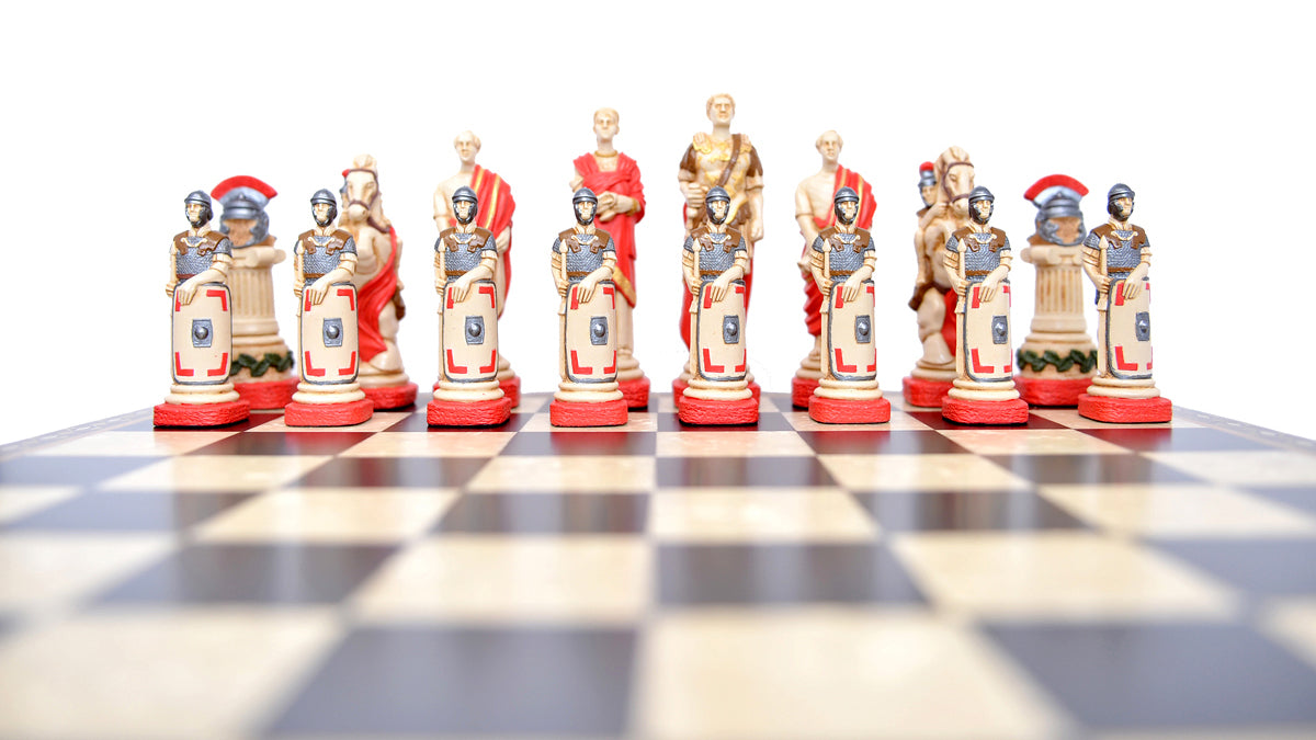 Low angle shot of The Roman side of a Hand Painted Spartacus themed chess set, with Pieces depicting Licinius Crassus, A Roman Lady, A Roman Senator and Roman Legionnaires.