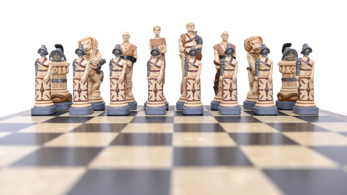 Low angle shot of The Gladiator side of a Spartacus themed hand painted chess set, with Pieces depicting Spartacus and various slaves and gladiators.
