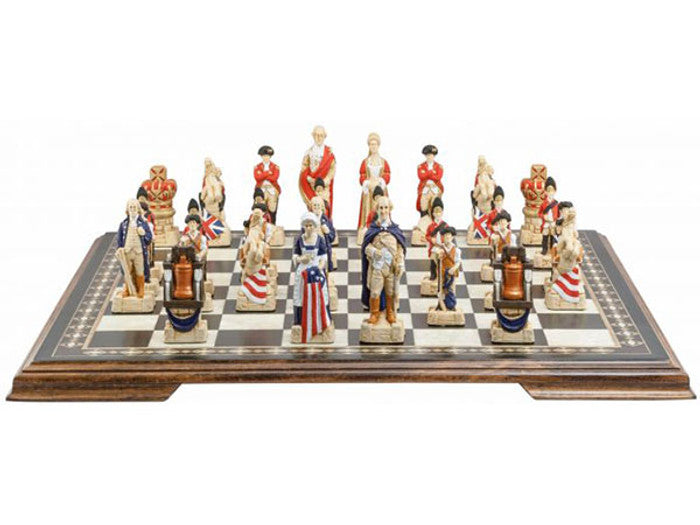 A handmade chess set depicting figures from the American Revolutionary War, placed on a chess board. The figures include representations of George Washington, Benjamin Franklin, and other historical figures.