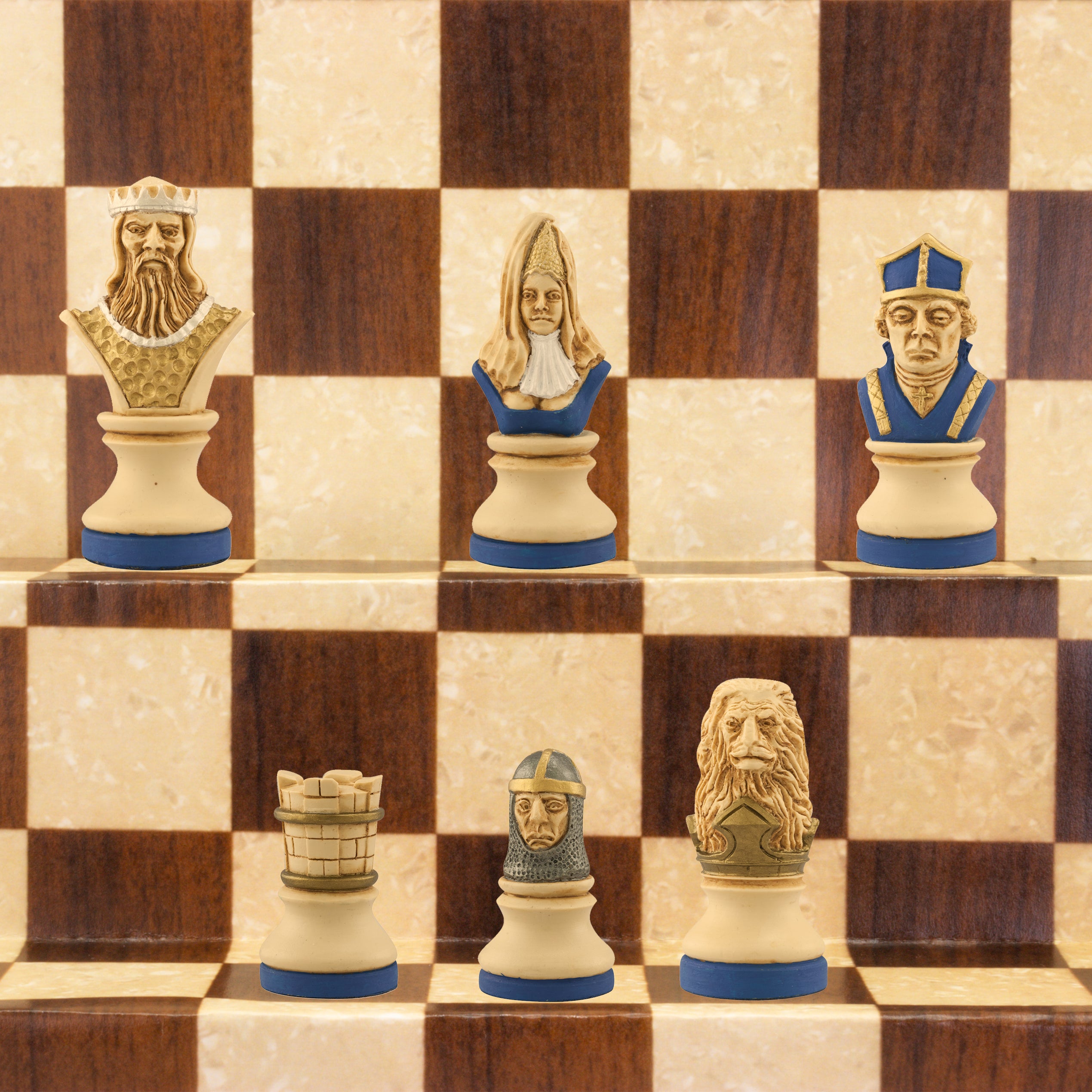 The blue coloured side of a hand painted themed chess set, designed with a blend of the classic styles of Staunton and the Old French Dieppe, featuring characters such as Richard I as the King, Elanor of Aquitaine as the Queen, Hubert Walder as the Bishop, A Lion as the Knight, and William Marshall as the Pawn.