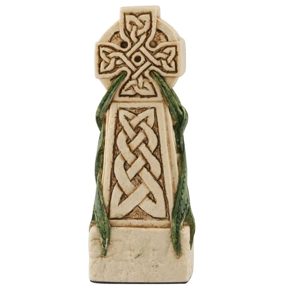 A handmade chess piece featuring a Celtic Cross.