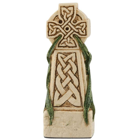 A handmade chess piece featuring a Celtic Cross.