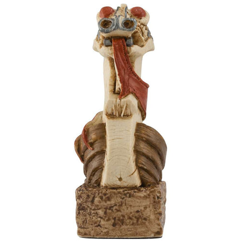A handmade chess piece featuring a Viking Longship.