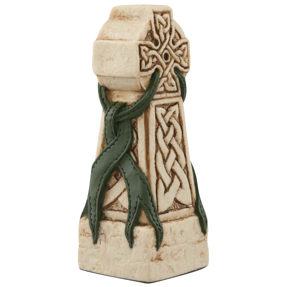 A handmade chess piece featuring a Celtic Cross.