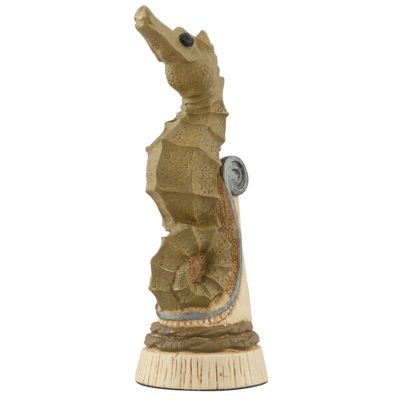A hand painted gold coloured Knight chess piece depicting a Sea Horse, found in many of the worlds warm and shallow oceans, it is a universally recognised symbol of the sea.