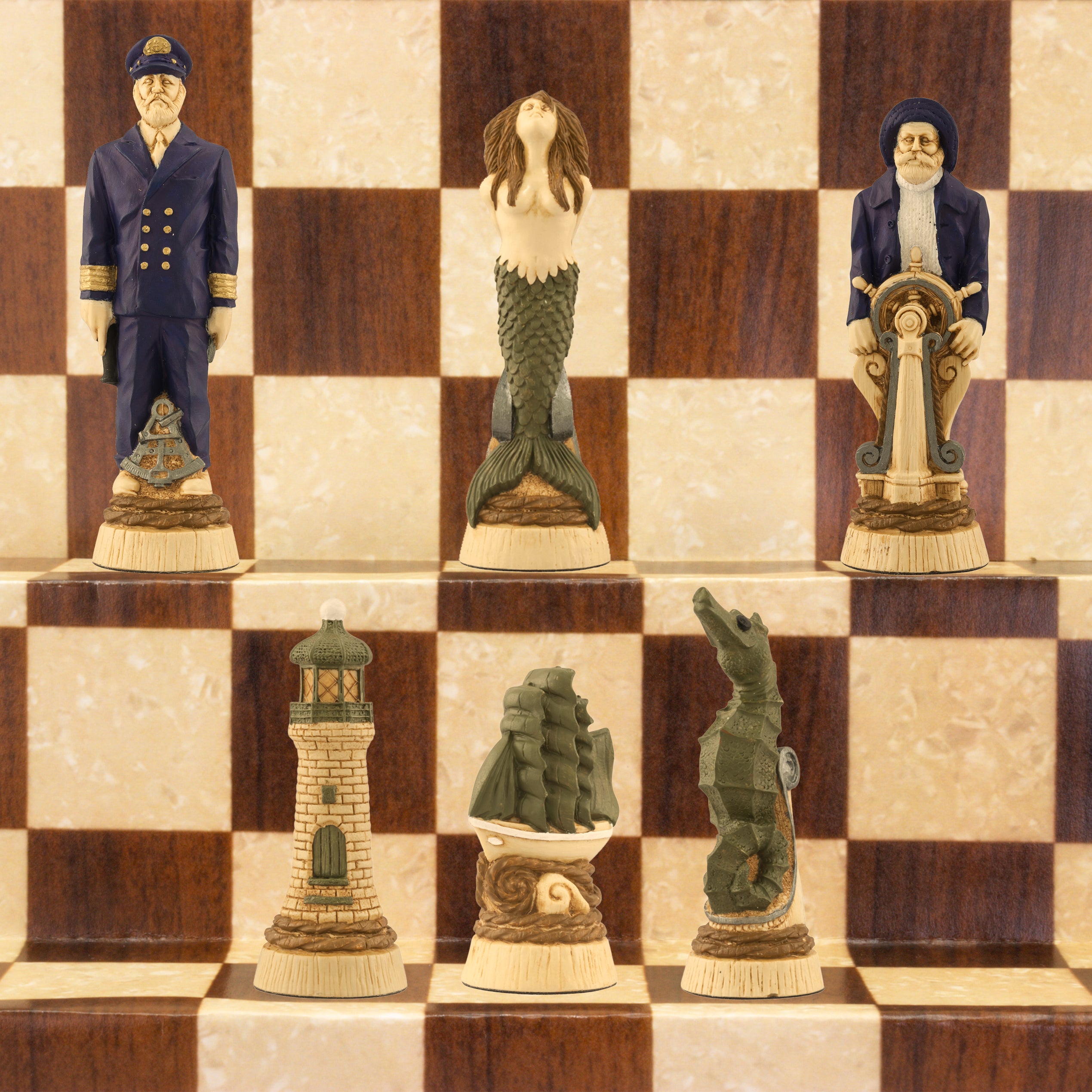 The cream base, green accented side of a nautical-themed hand painted chess set with pieces including a Captain, Mermaid, Navigator, Seahorse, Lighthouse, and Ship, displayed on a brown and beige chess board.