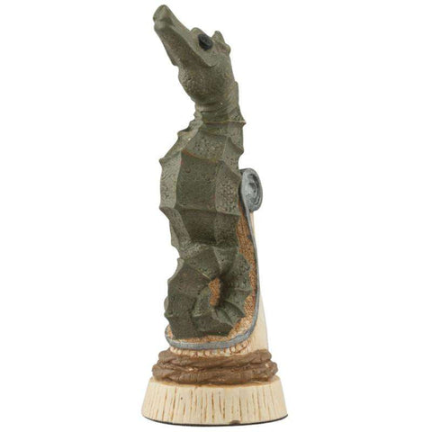 A hand painted green coloured Knight chess piece depicting a Sea Horse, found in many of the worlds warm and shallow oceans, it is a universally recognised symbol of the sea.