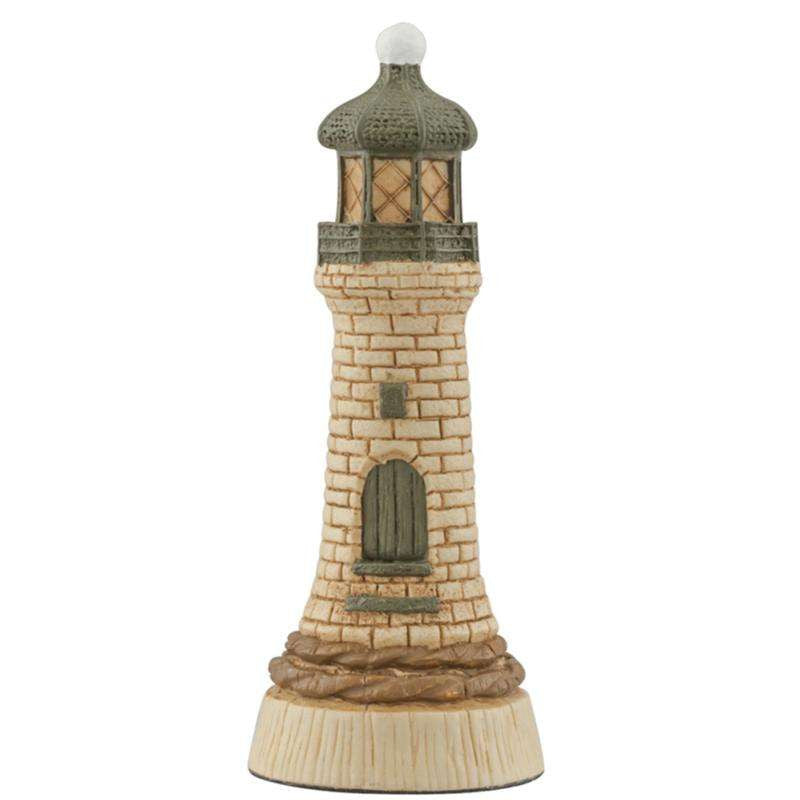 A hand painted cream base, green accented Rook chess piece depicting a LightHouse, built to warn sailors of the proximity of rocks through thick fog and sea mist.