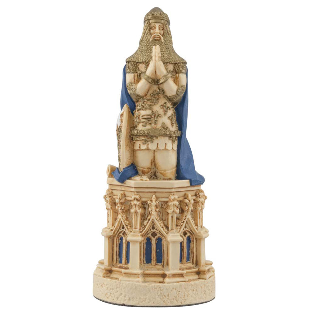 A hand painted cream base, blue accented chess piece depicting Edward the Black Prince, the eldest son of King Edward III, inspired by the depiction on his tomb in the Canterbury Cathedral. 