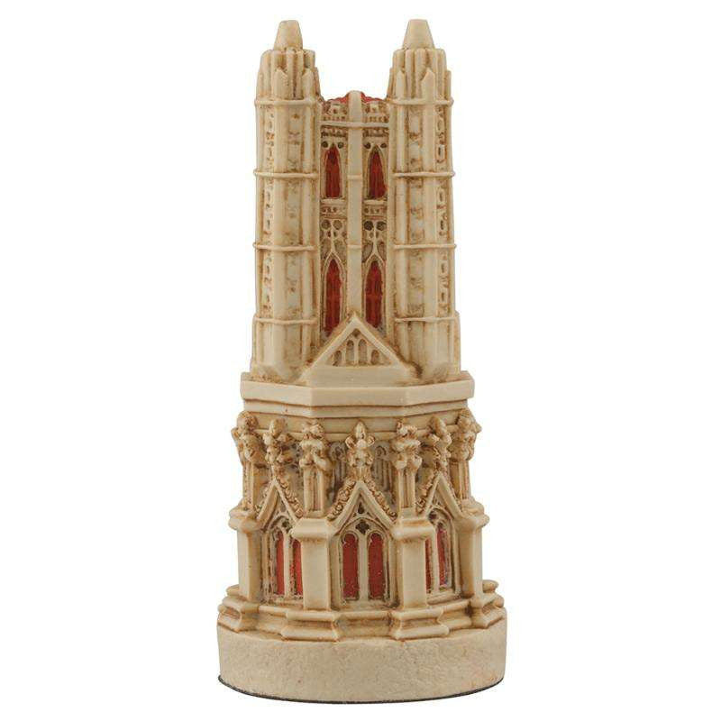 A hand painted cream base, red accented chess piece depicting a magnificent bell tower, typically found in most cathedrals.
