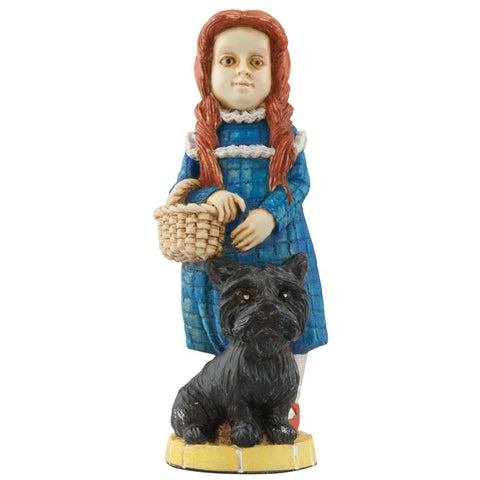 Hand painted Queen chess piece Depicting Dorothy from the Wonderful Wizard of Oz, with a wicker basket and Toto, her faithful companion.