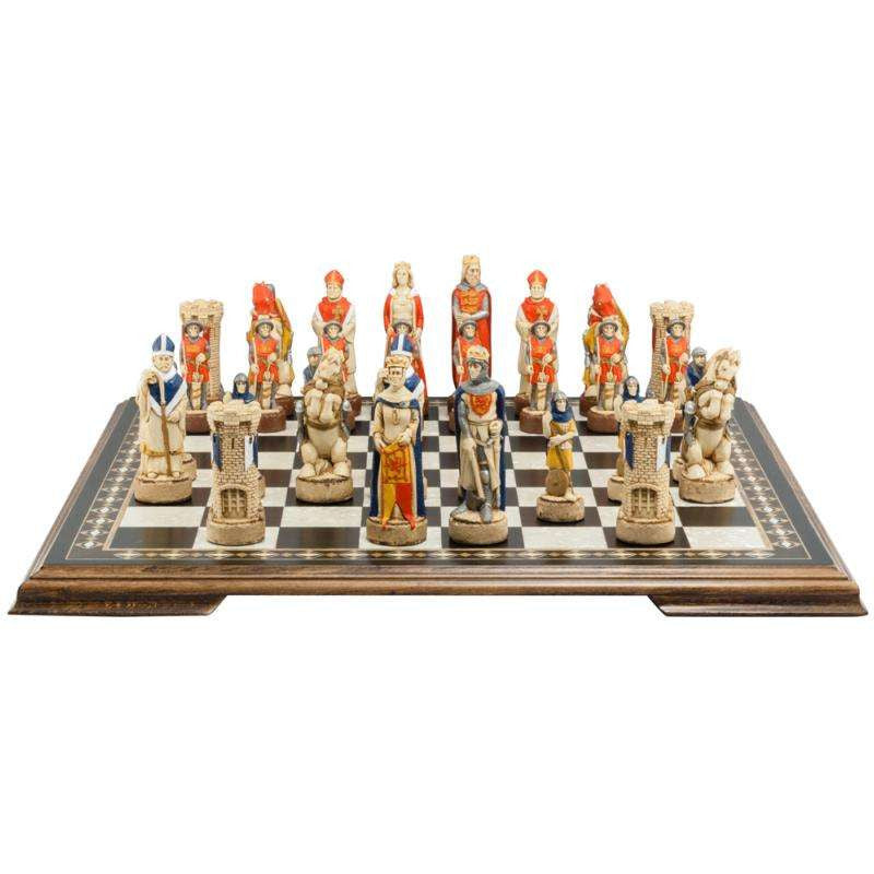 Hand-painted chess pieces depicting characters from the Battle of Bannockburn, placed on a chessboard.