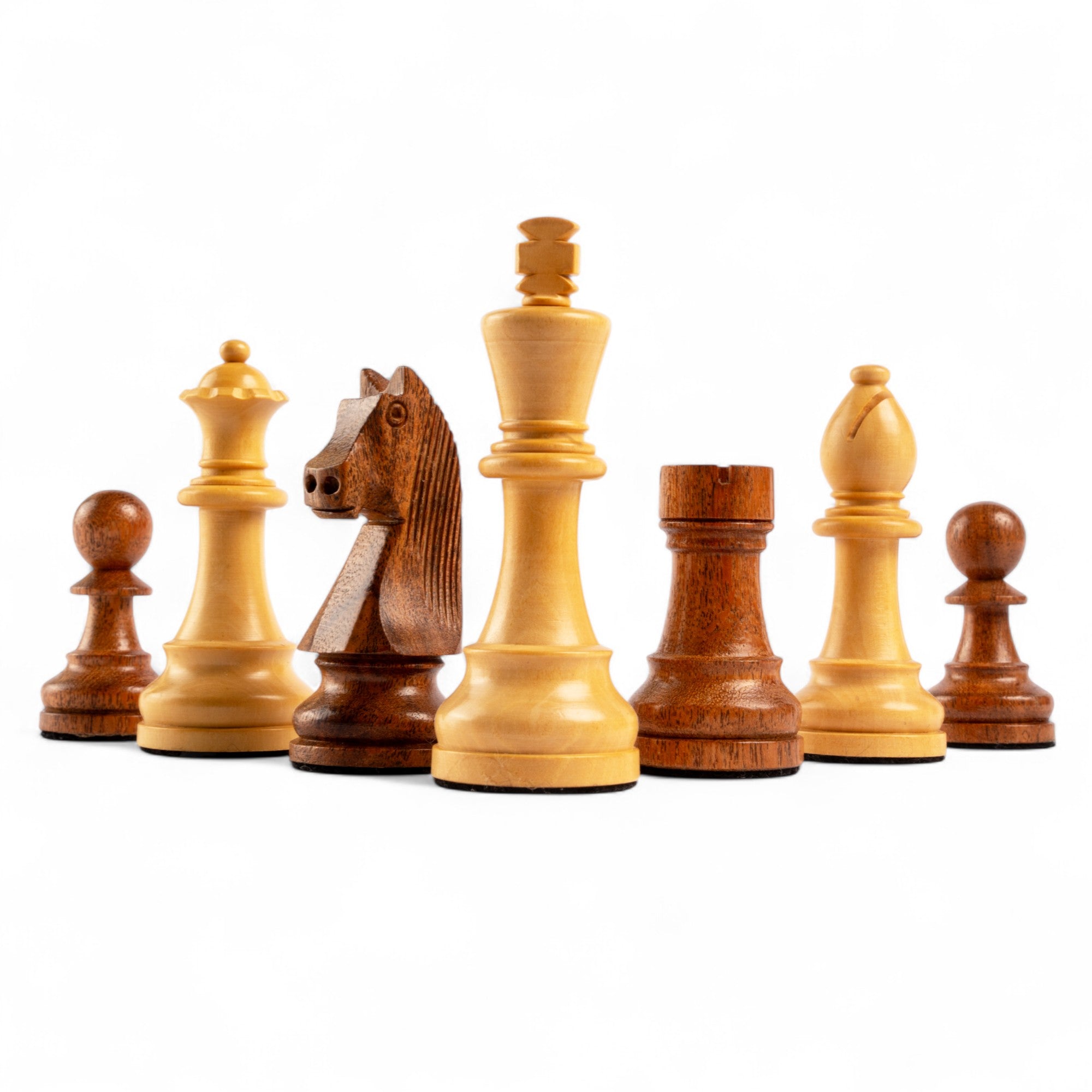 Wooden chess pieces on a white background