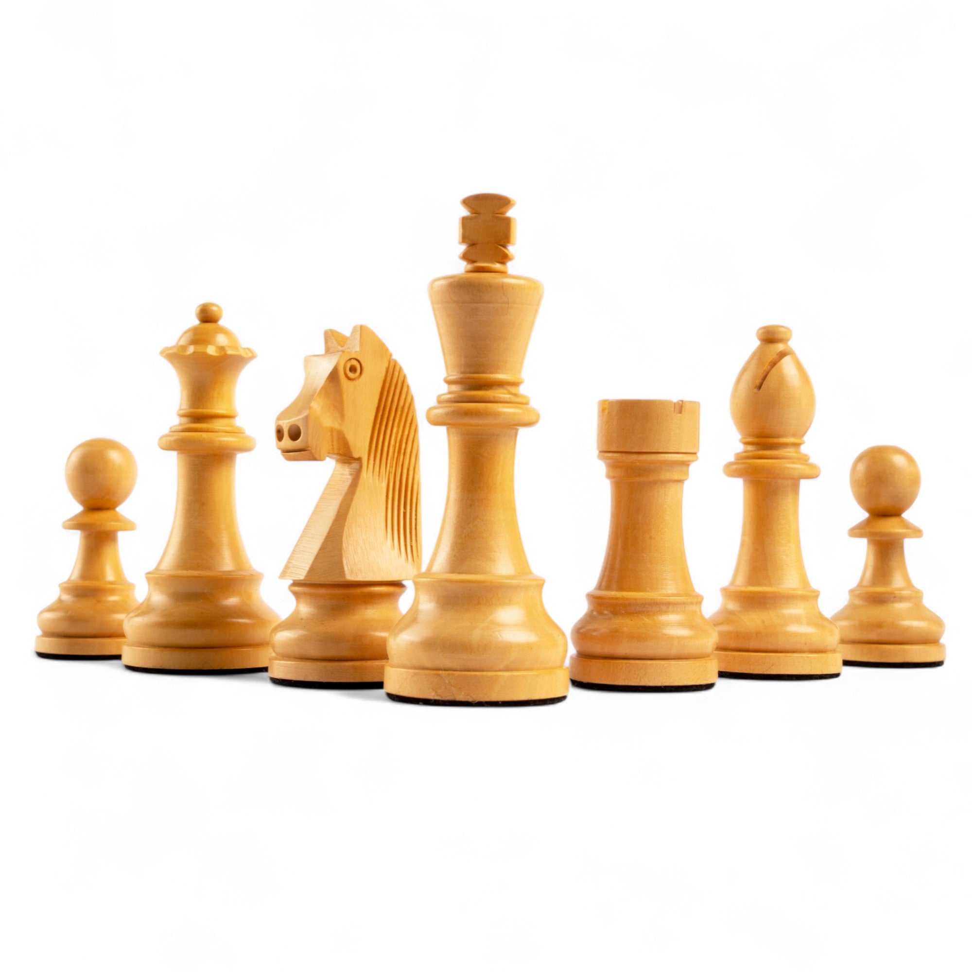 Set of wooden chess pieces on a white background