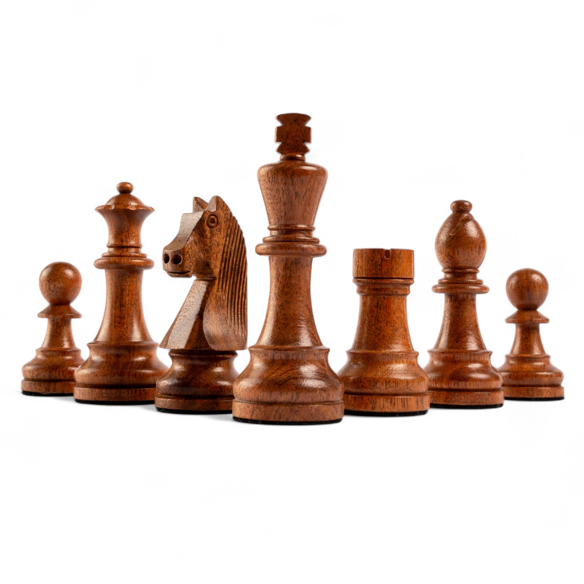 Wooden chess pieces on a white background