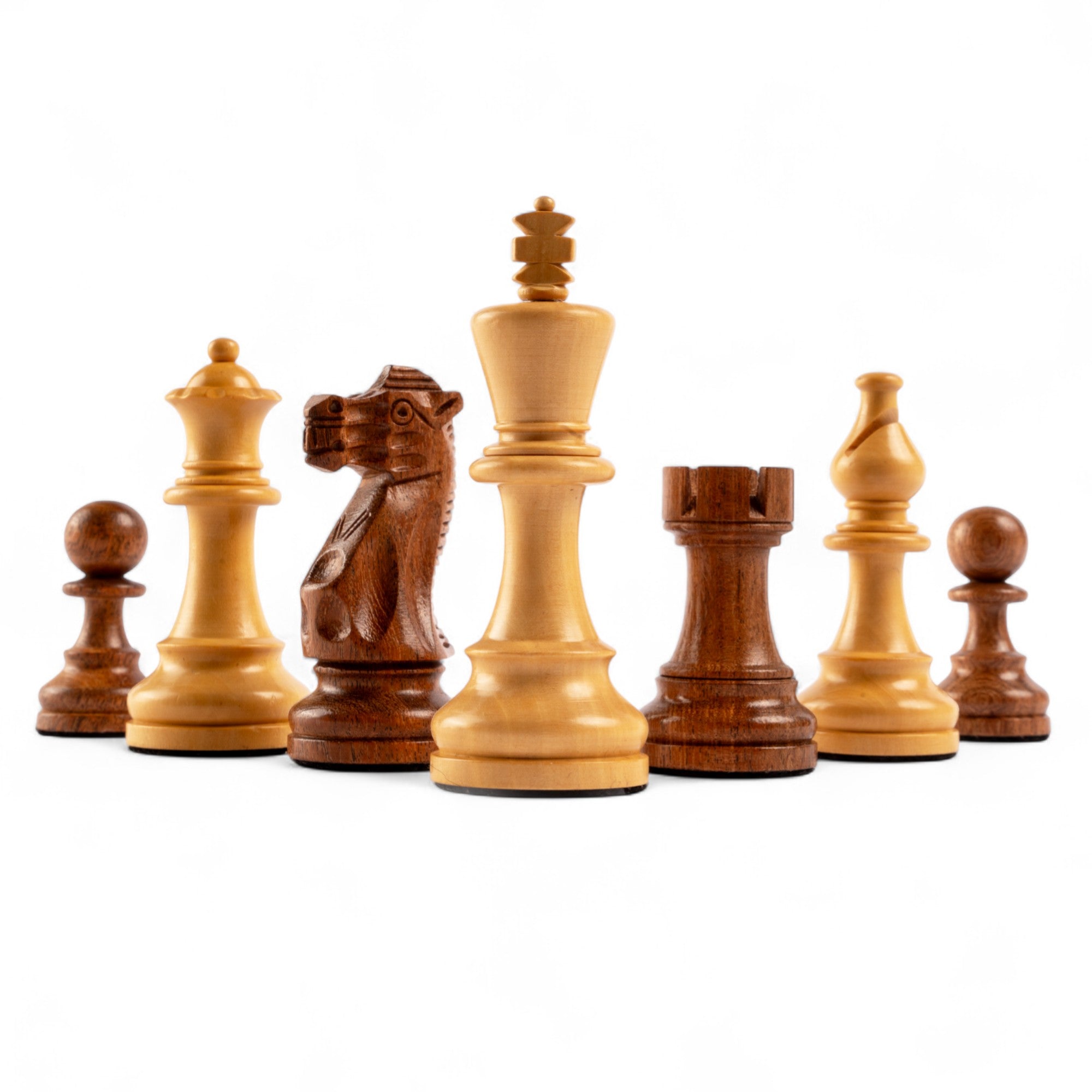 Set of wooden chess pieces on a white background