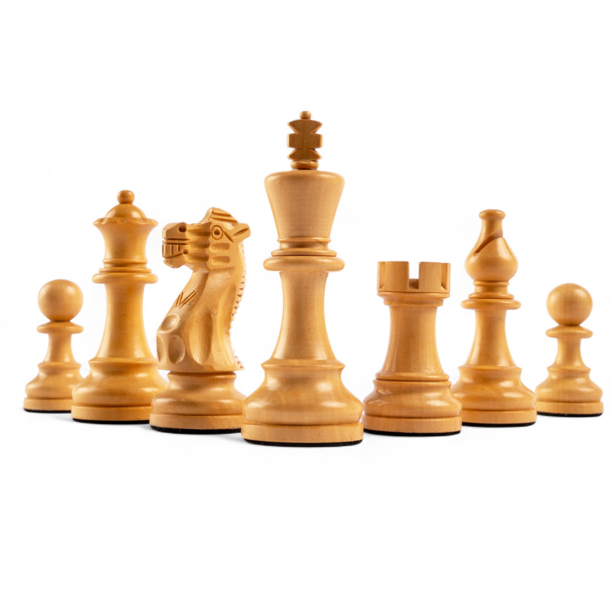 Set of wooden chess pieces on a white background