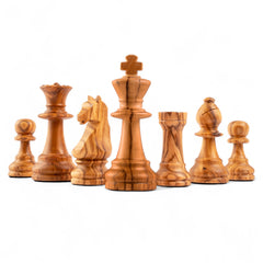Set of wooden chess pieces on a white background