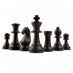 Set of black chess pieces on a white background