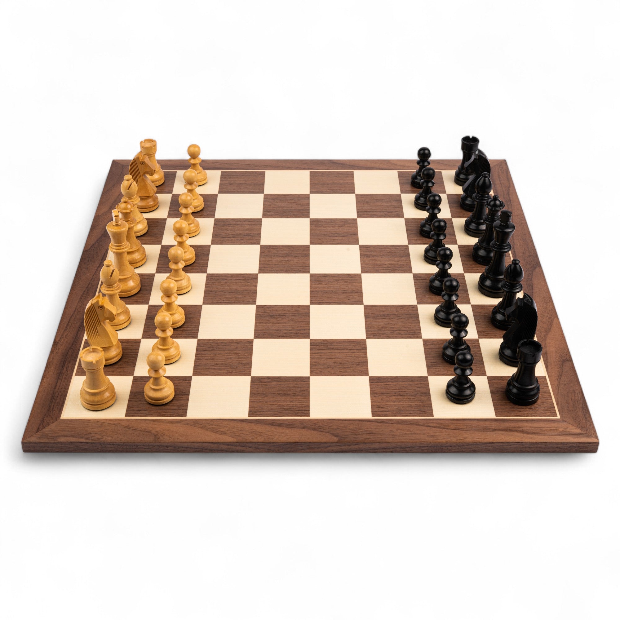 Wooden chessboard with pieces on a white background