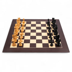 Wooden chessboard with black and white pieces on a white background