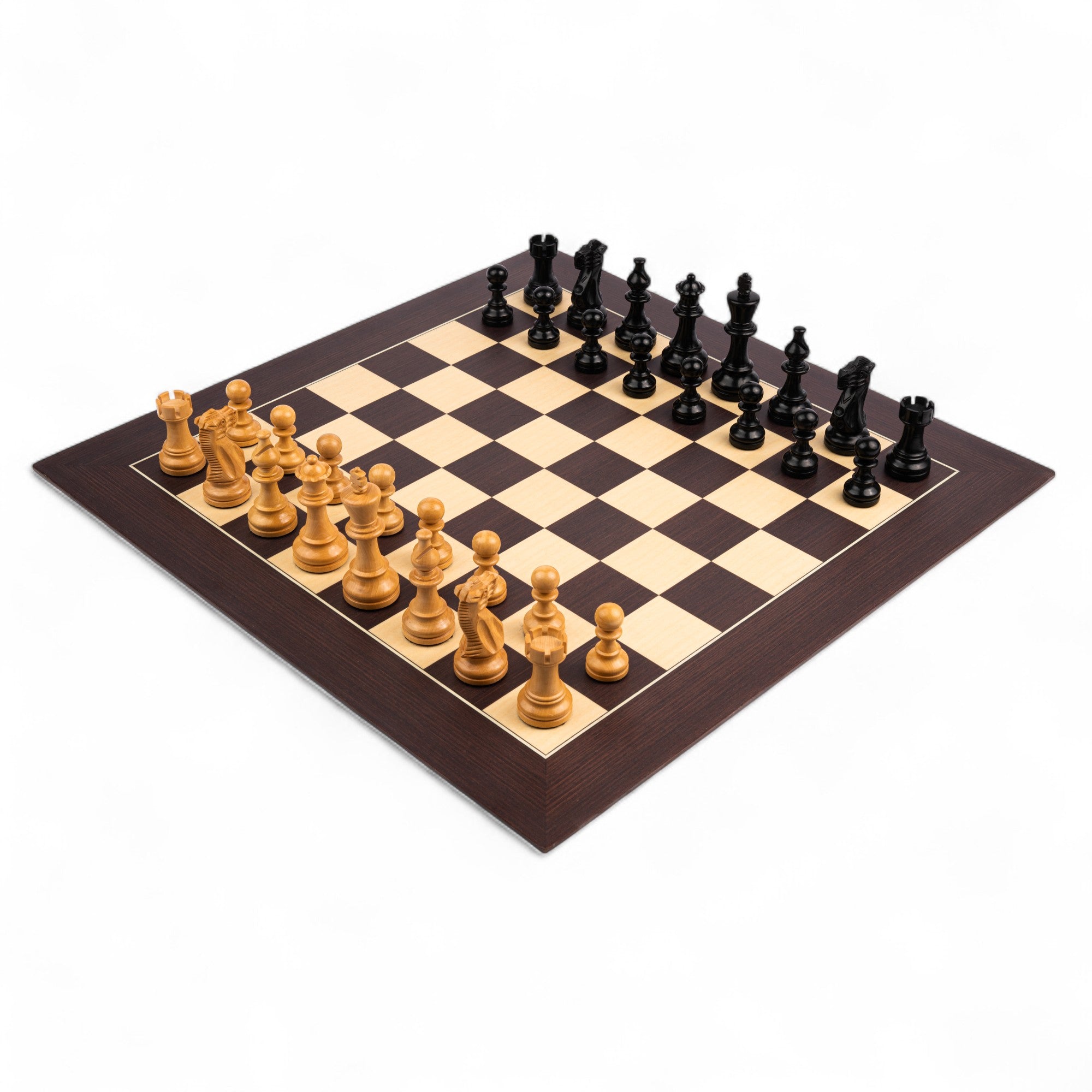 Wooden chessboard with black and brown pieces on a white background