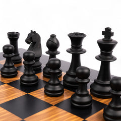 Wooden chess pieces on a checkered chessboard