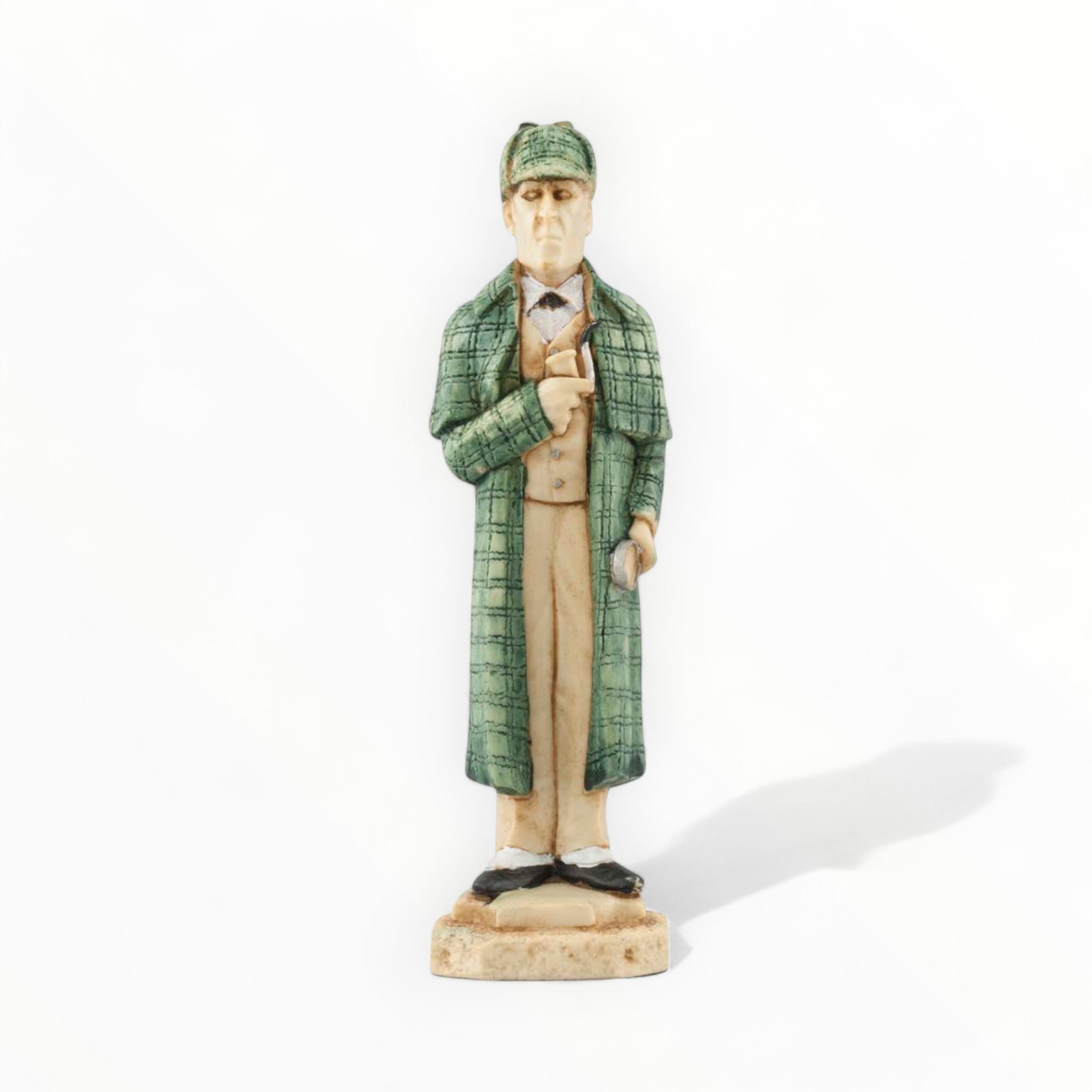A hand painted chess piece depicting Sherlock Holmes.