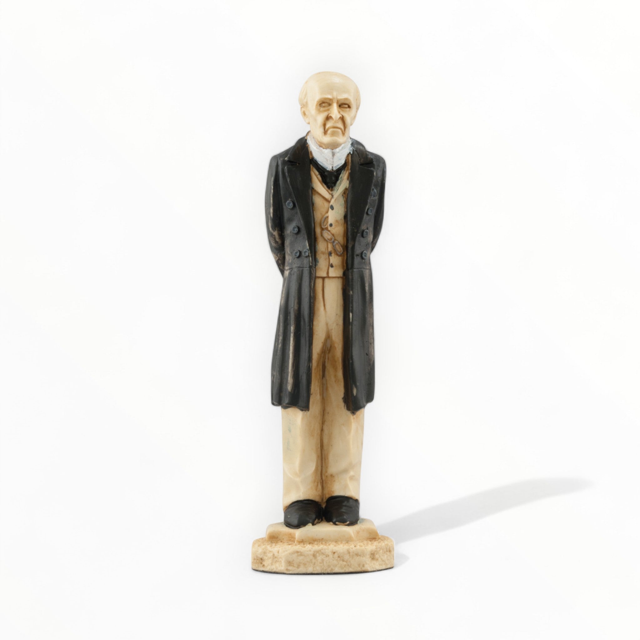 A hand painted chess piece depicting Professor Moriarty from The stories of Sherlock Holmes.