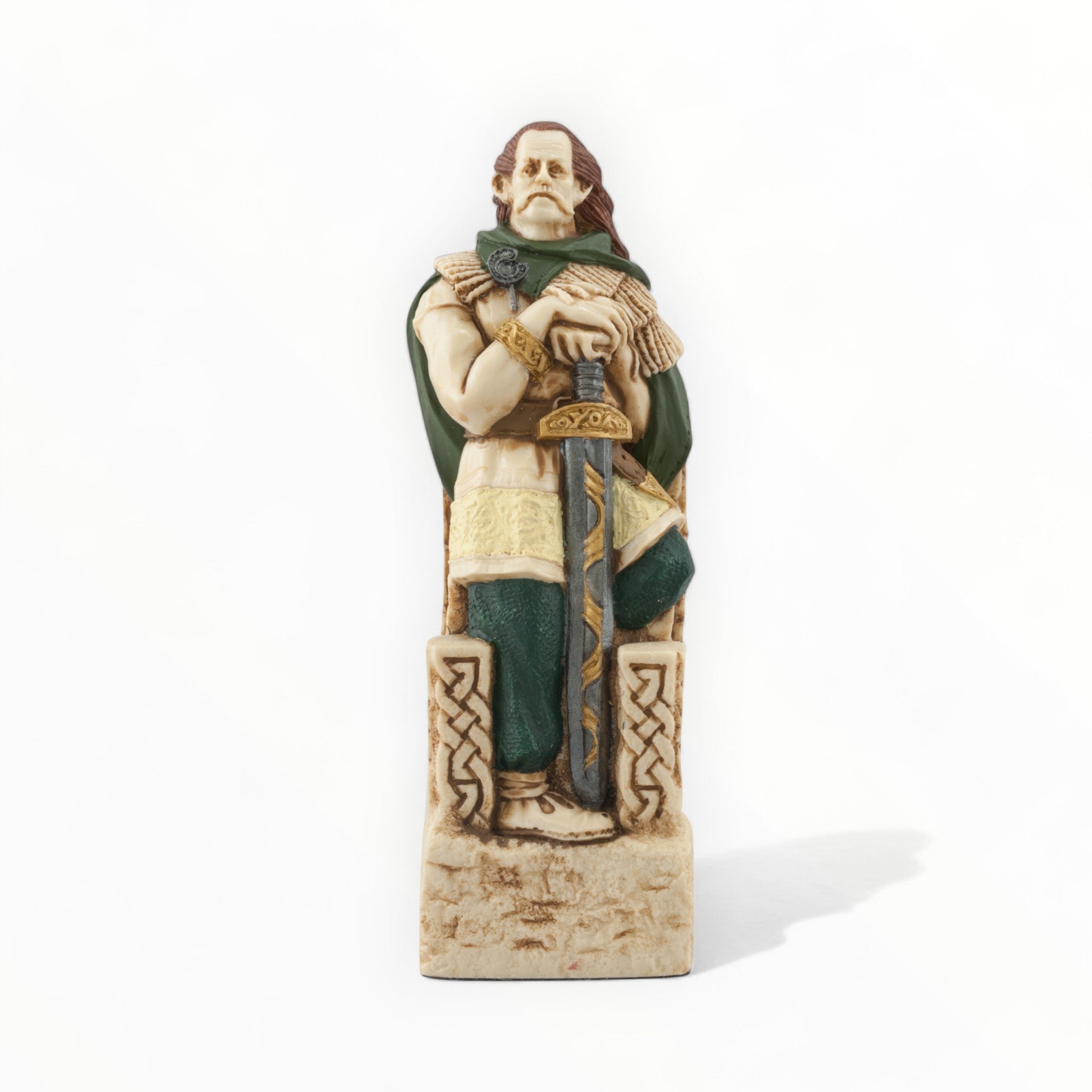 A hand painted chess piece depicting a Celtic Chieftan.