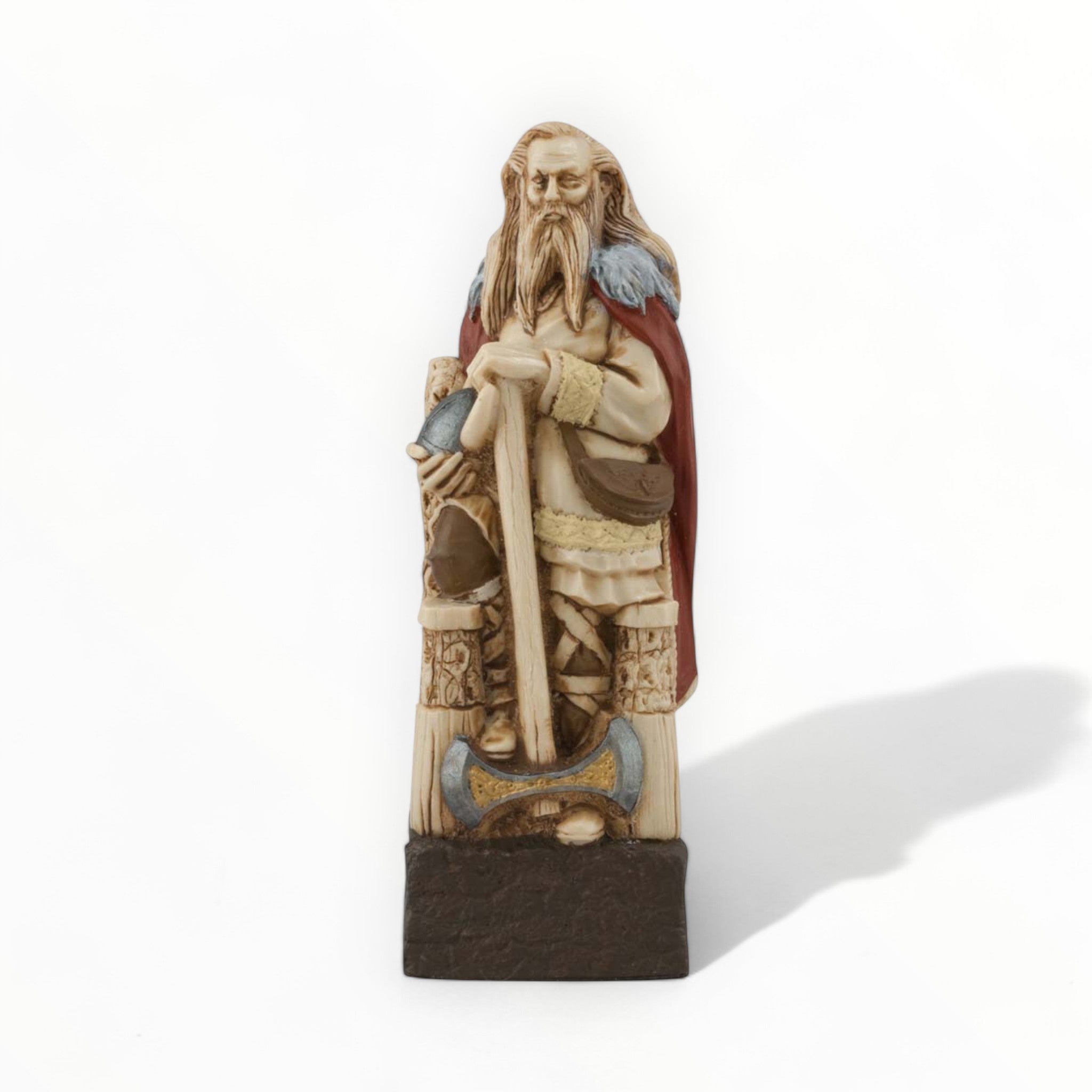 A hand painted chess piece depicting a Viking Chieftan.